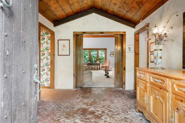 66 Susan Dr, Newburgh, NY 12550 - corridor featuring brick floors, vaulted ceiling, and wood ceiling