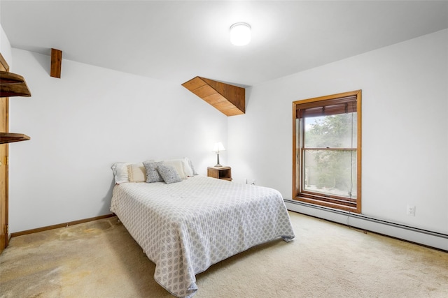 66 Susan Dr, Newburgh, NY 12550 - carpeted bedroom featuring a baseboard heating unit