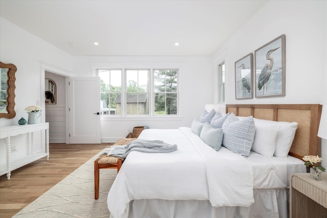480 Ackerly Pond Ln, Southold, NY 11971 - bedroom featuring wood finished floors and recessed lighting