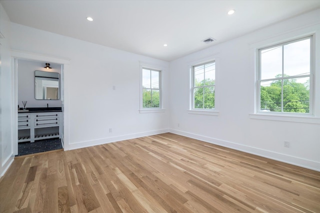 480 Ackerly Pond Ln, Southold, NY 11971 - unfurnished bedroom featuring light wood finished floors, baseboards, and recessed lighting