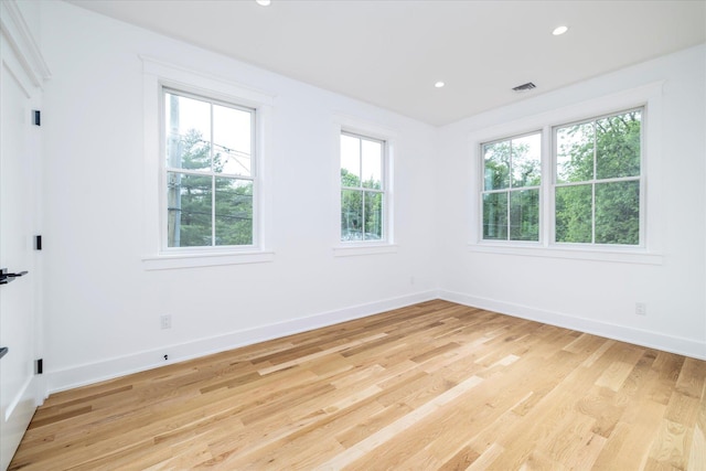 480 Ackerly Pond Ln, Southold, NY 11971 - empty room featuring light wood-style flooring, recessed lighting, and baseboards