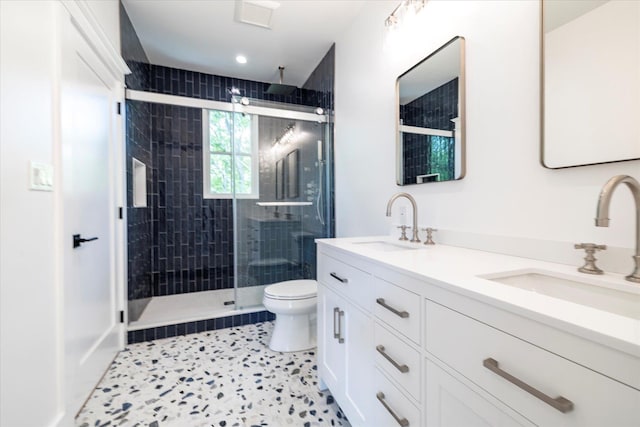 480 Ackerly Pond Ln, Southold, NY 11971 - bathroom with double vanity, a stall shower, toilet, and recessed lighting