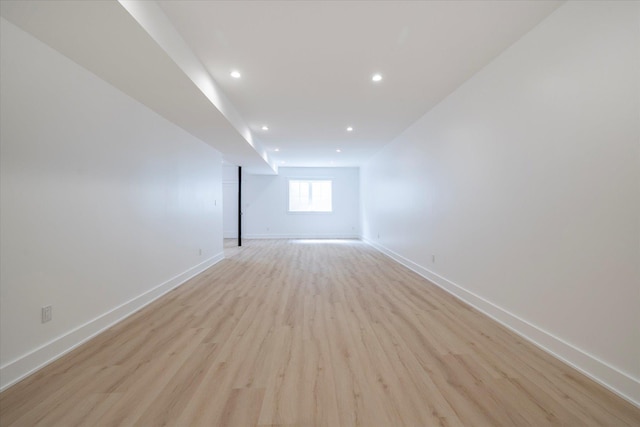 480 Ackerly Pond Ln, Southold, NY 11971 - unfurnished room with light wood finished floors, baseboards, and recessed lighting