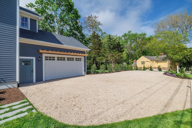 480 Ackerly Pond Ln, Southold, NY 11971 - garage with gravel driveway