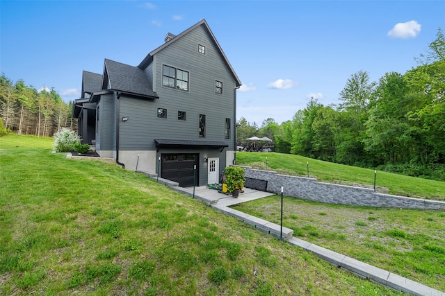 36 Spruce Ln, Poughkeepsie, NY 12603 - view of side of property with an attached garage, a yard, and a shingled roof
