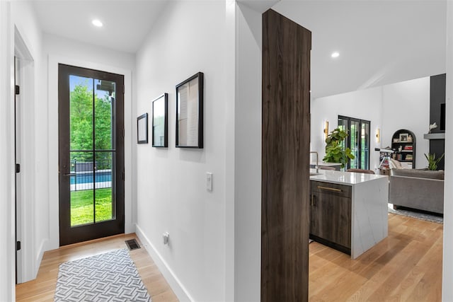 36 Spruce Ln, Poughkeepsie, NY 12603 - foyer with light wood-style floors, plenty of natural light, baseboards, and recessed lighting