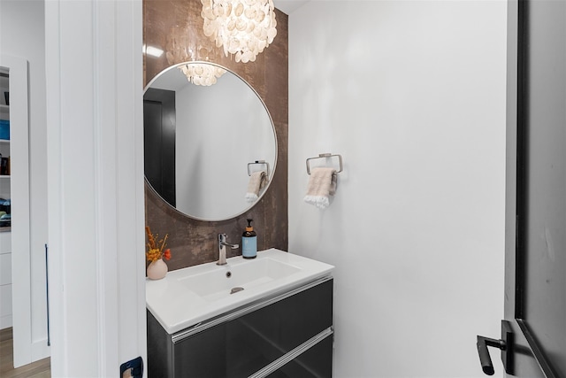 36 Spruce Ln, Poughkeepsie, NY 12603 - bathroom with vanity and a chandelier