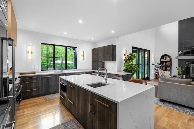 36 Spruce Ln, Poughkeepsie, NY 12603 - kitchen featuring a sink, an island with sink, modern cabinets, open floor plan, and recessed lighting