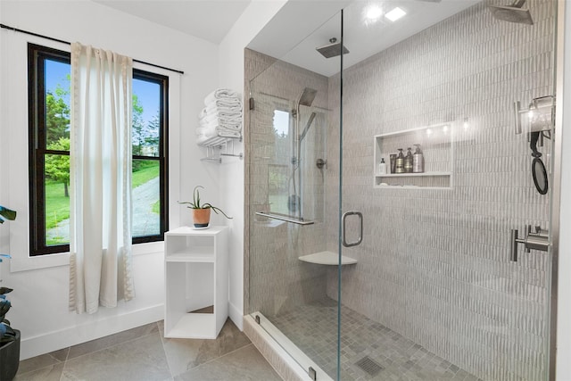 36 Spruce Ln, Poughkeepsie, NY 12603 - full bathroom featuring a stall shower, tile patterned flooring, and baseboards