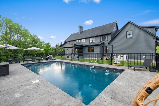 36 Spruce Ln, Poughkeepsie, NY 12603 - view of pool featuring a patio area and fence
