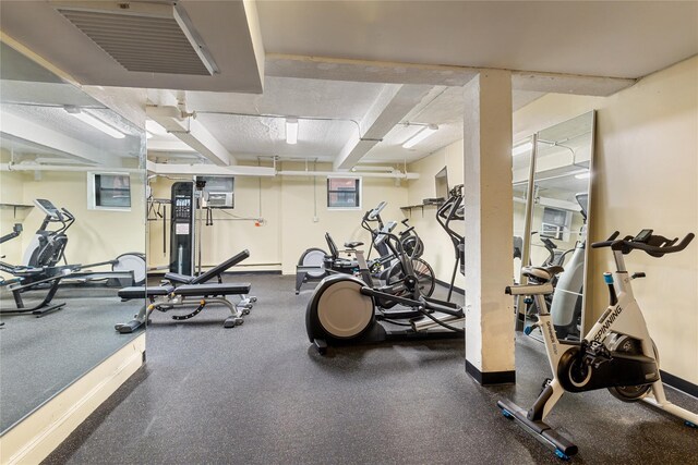 100-11 67th Rd Unit 416, Forest Hills, NY 11375 - exercise room featuring baseboards