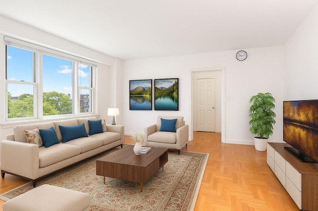 210 Pelham Rd Unit 6H, New Rochelle, NY 10805 - living room featuring baseboards