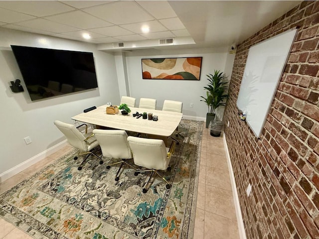 210 Pelham Rd Unit 6H, New Rochelle, NY 10805 - tiled dining space with brick wall, baseboards, recessed lighting, and a drop ceiling