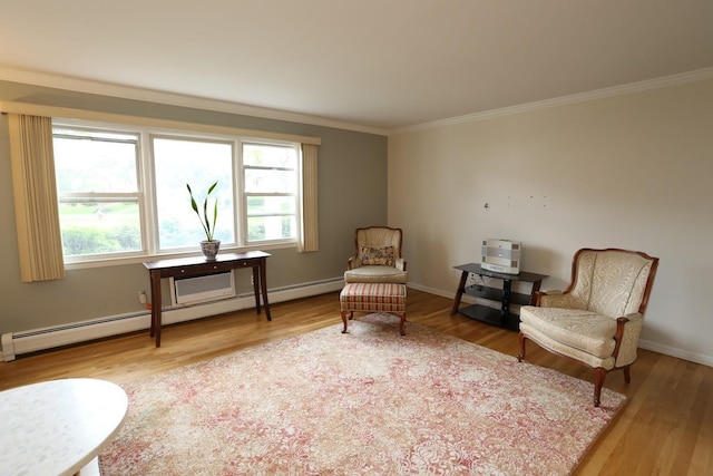 35 Bon Aire Cir Unit 8113, Suffern, NY 10901 - sitting room featuring a baseboard heating unit, wood finished floors, crown molding, and baseboards