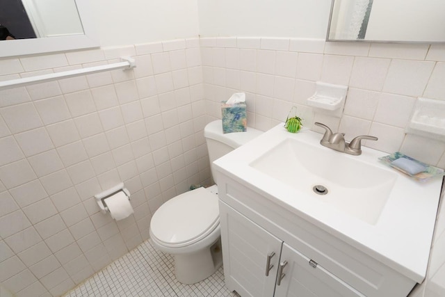 35 Bon Aire Cir Unit 8113, Suffern, NY 10901 - half bath featuring tile walls, toilet, tile patterned floors, and vanity