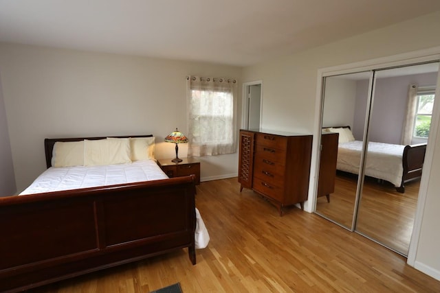 35 Bon Aire Cir Unit 8113, Suffern, NY 10901 - bedroom with light wood-style floors, a closet, and baseboards