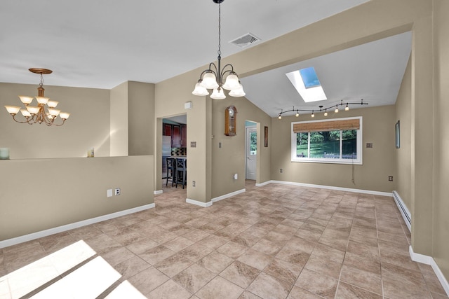 232 County Route 49, Slate Hill, NY 10973 - empty room with a chandelier, rail lighting, baseboards, a skylight, and lofted ceiling
