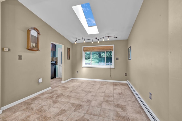 232 County Route 49, Slate Hill, NY 10973 - unfurnished room with baseboard heating, a skylight, rail lighting, baseboards, and lofted ceiling