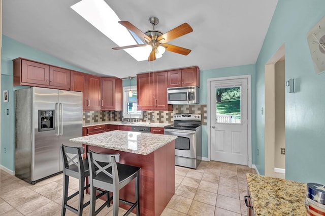 232 County Route 49, Slate Hill, NY 10973 - kitchen featuring stainless steel appliances, backsplash, plenty of natural light, a sink, and lofted ceiling