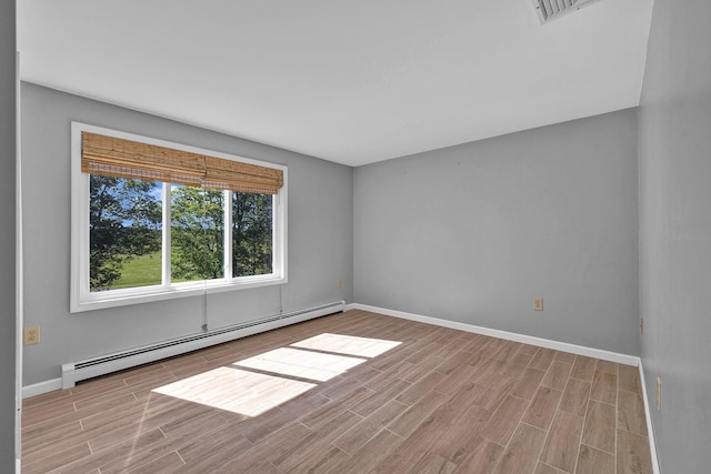 232 County Route 49, Slate Hill, NY 10973 - unfurnished room featuring a baseboard radiator, wood finished floors, and baseboards