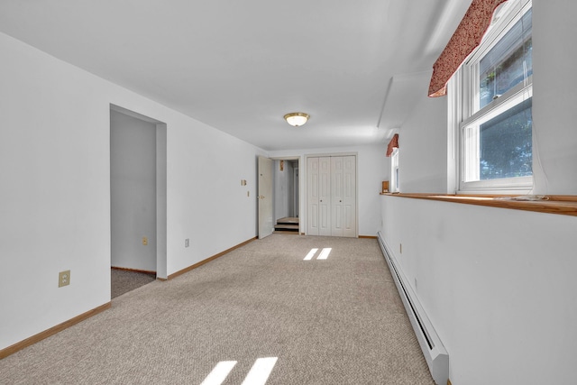 232 County Route 49, Slate Hill, NY 10973 - unfurnished room featuring a baseboard radiator, light colored carpet, and baseboards