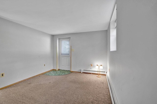 232 County Route 49, Slate Hill, NY 10973 - carpeted spare room featuring a baseboard heating unit and baseboards