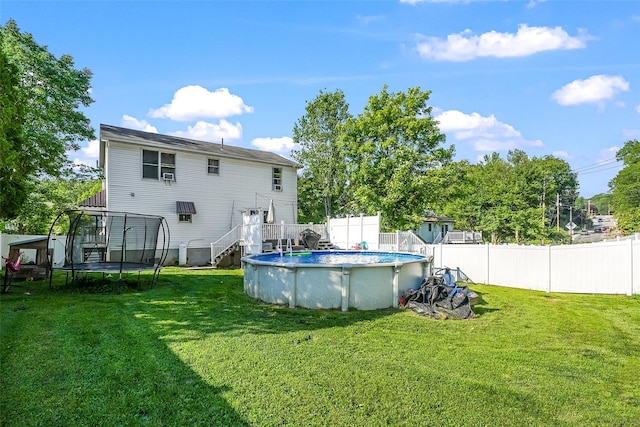 4 Kyle Ct, Carmel, NY 10512 - rear view of property with a trampoline