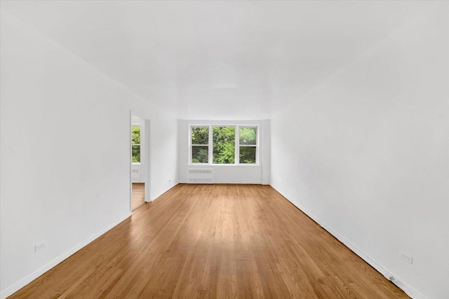 4320 E Van Cortlandt Park E Unit 5E, Bronx, NY 10470 - unfurnished room with radiator and wood finished floors
