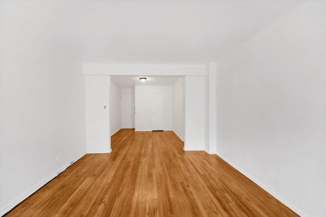 4320 E Van Cortlandt Park E Unit 5E, Bronx, NY 10470 - spare room featuring wood finished floors and baseboards