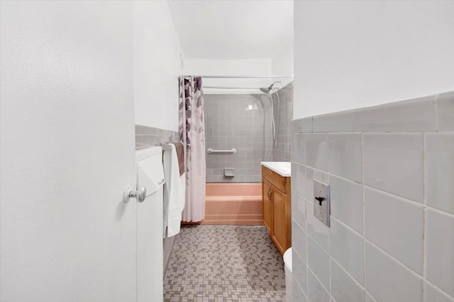 4320 E Van Cortlandt Park E Unit 5E, Bronx, NY 10470 - bathroom featuring tile walls, vanity, shower / bath combo, tile patterned floors, and wainscoting
