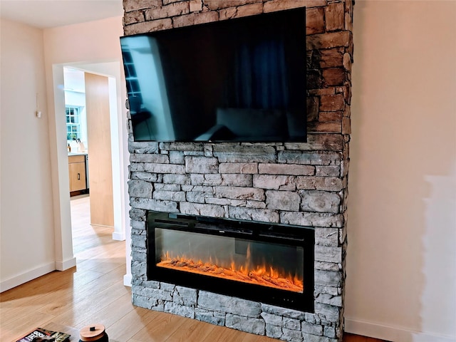 7 Fayer Ct, Phillipsport, NY 12769 - detailed view of a fireplace, wood finished floors, and baseboards