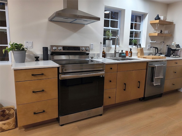7 Fayer Ct, Phillipsport, NY 12769 - kitchen featuring appliances with stainless steel finishes, wall chimney exhaust hood, a sink, light wood-type flooring, and open shelves