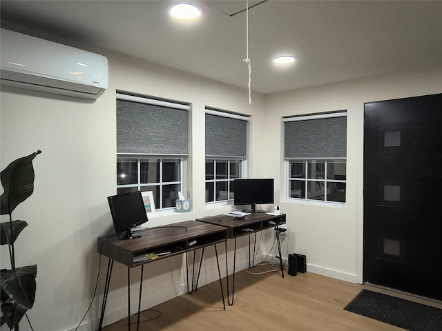 7 Fayer Ct, Phillipsport, NY 12769 - office area featuring a wall unit AC, wood finished floors, baseboards, and recessed lighting