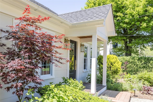 350 Skunk Ln, Cutchogue, NY 11935 - property entrance with a shingled roof