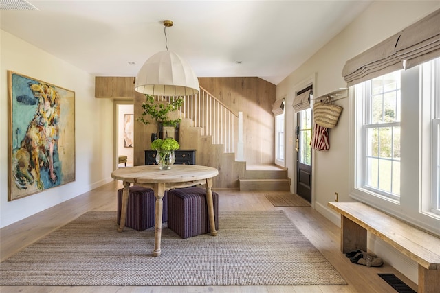 350 Skunk Ln, Cutchogue, NY 11935 - dining area with stairway and wood finished floors