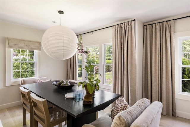 350 Skunk Ln, Cutchogue, NY 11935 - dining room featuring light wood-style flooring and baseboards