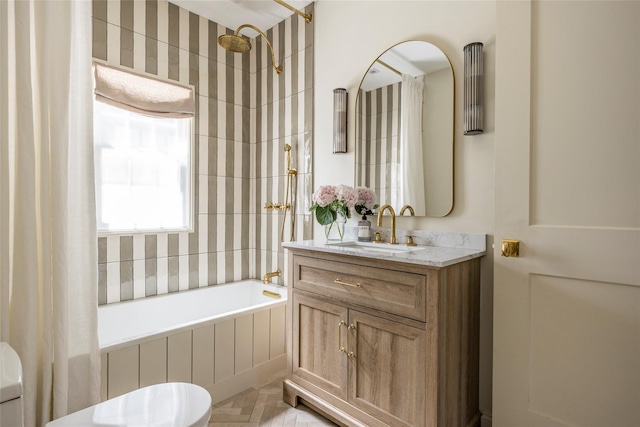350 Skunk Ln, Cutchogue, NY 11935 - full bathroom with toilet, tiled shower / bath, and vanity