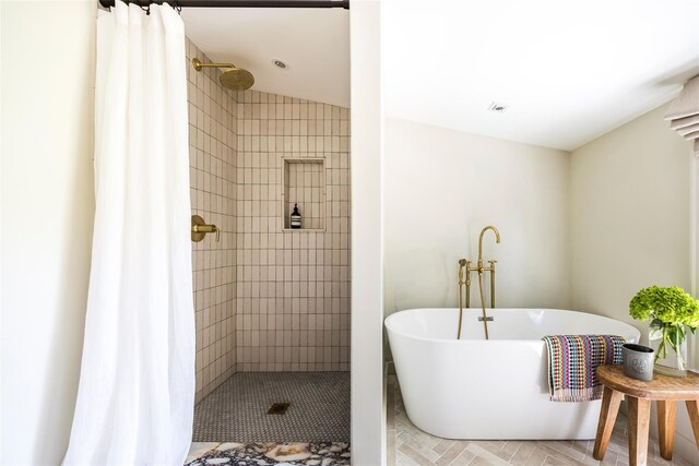 350 Skunk Ln, Cutchogue, NY 11935 - bathroom with tiled shower and a freestanding bath