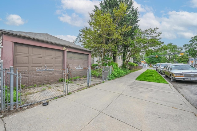139-01 Linden Blvd, South Ozone Park, NY 11436 - garage featuring a gate and fence