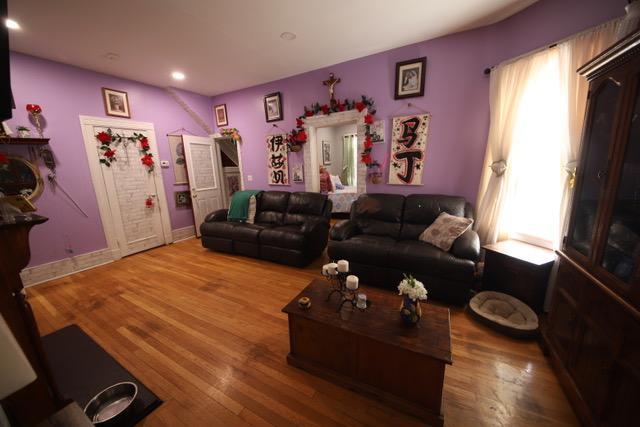 228 N 5th Ave, Mount Vernon, NY 10550 - living room featuring wood finished floors, recessed lighting, and baseboards