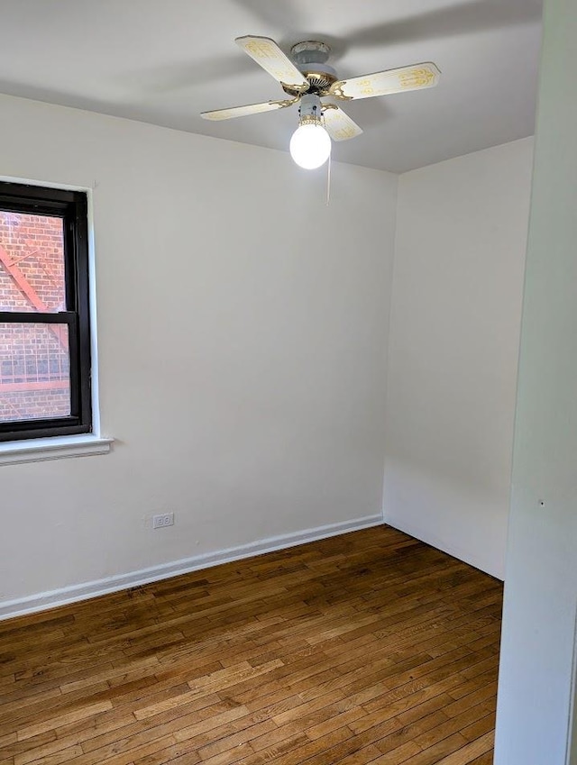 94-31 59th Ave Unit 4B, Elmhurst, NY 11373 - spare room featuring hardwood / wood-style flooring, ceiling fan, and baseboards