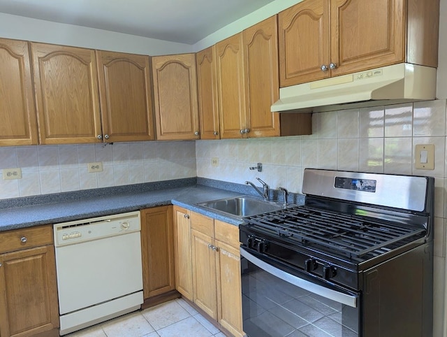 94-31 59th Ave Unit 4B, Elmhurst, NY 11373 - kitchen featuring white dishwasher, stainless steel gas stove, under cabinet range hood, a sink, and dark countertops