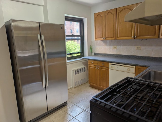94-31 59th Ave Unit 4B, Elmhurst, NY 11373 - kitchen featuring freestanding refrigerator, under cabinet range hood, white dishwasher, radiator heating unit, and tasteful backsplash