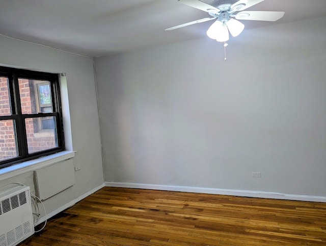 94-31 59th Ave Unit 4B, Elmhurst, NY 11373 - empty room with wood finished floors, a ceiling fan, and baseboards