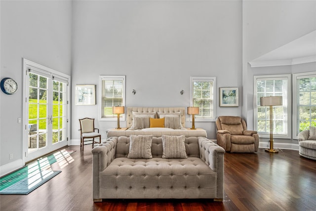 55 Westgate Rd, Muttontown, NY 11791 - bedroom with a high ceiling, access to exterior, wood finished floors, multiple windows, and baseboards