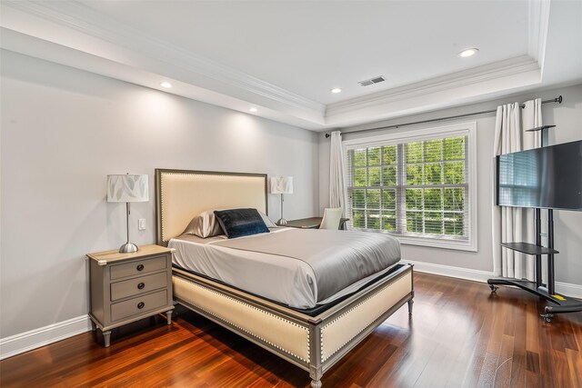 55 Westgate Rd, Muttontown, NY 11791 - bedroom featuring a raised ceiling, crown molding, dark wood-style flooring, baseboards, and recessed lighting
