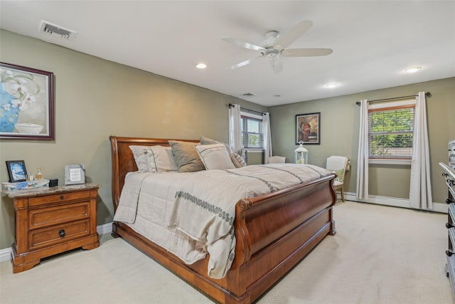 26 Wilson St, Port Jefferson Station, NY 11776 - bedroom with baseboards, multiple windows, light colored carpet, recessed lighting, and ceiling fan