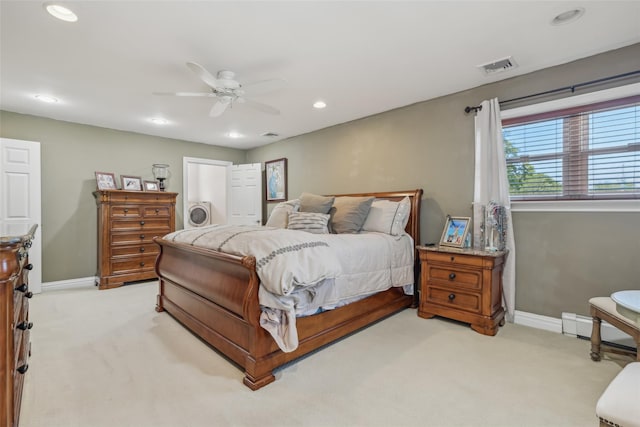 26 Wilson St, Port Jefferson Station, NY 11776 - bedroom with a baseboard radiator, light carpet, baseboards, and recessed lighting