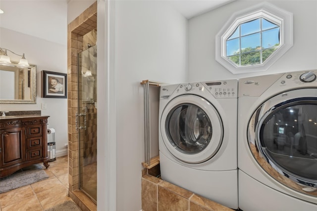 26 Wilson St, Port Jefferson Station, NY 11776 - washroom featuring washer and clothes dryer and light tile patterned flooring