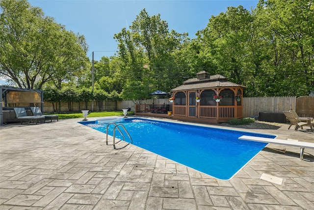 26 Wilson St, Port Jefferson Station, NY 11776 - view of swimming pool with a gazebo, a diving board, a patio, and a fenced backyard